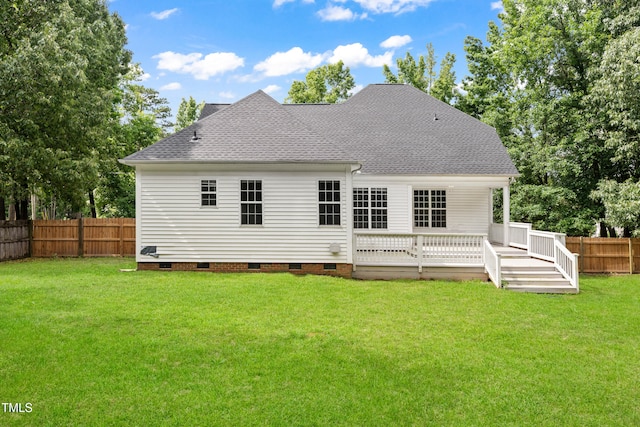2430 Josephine Rd, Garner, NC 27529 - back of property with crawl space, a fenced backyard, a shingled roof, and a wooden deck