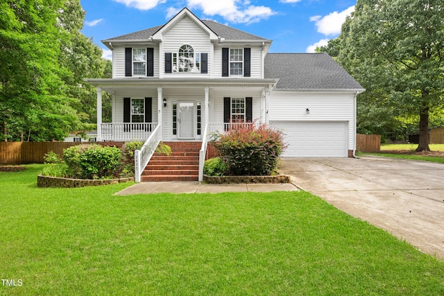 2430 Josephine Rd, Garner, NC 27529 - view of front of home featuring concrete driveway, covered porch, roof with shingles, and stairway