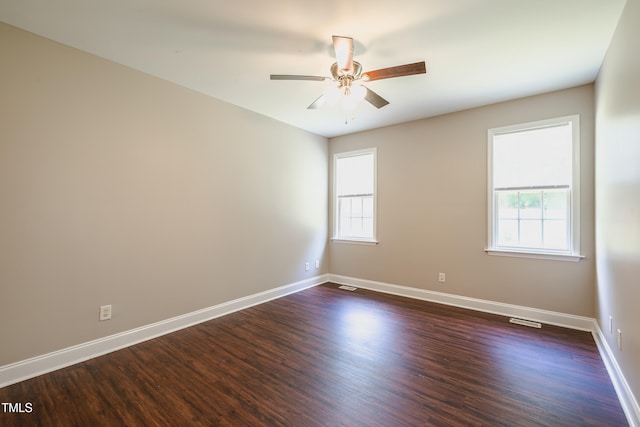 2430 Josephine Rd, Garner, NC 27529 - empty room featuring dark wood finished floors and a ceiling fan