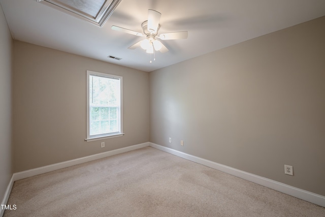 2430 Josephine Rd, Garner, NC 27529 - unfurnished room with light carpet, ceiling fan, and attic access