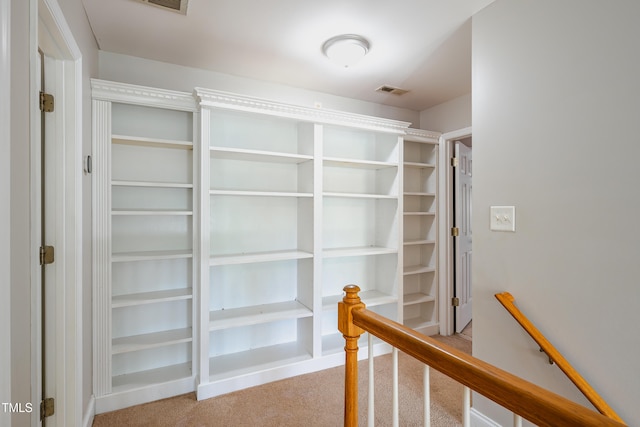 2430 Josephine Rd, Garner, NC 27529 - hallway with an upstairs landing and light carpet