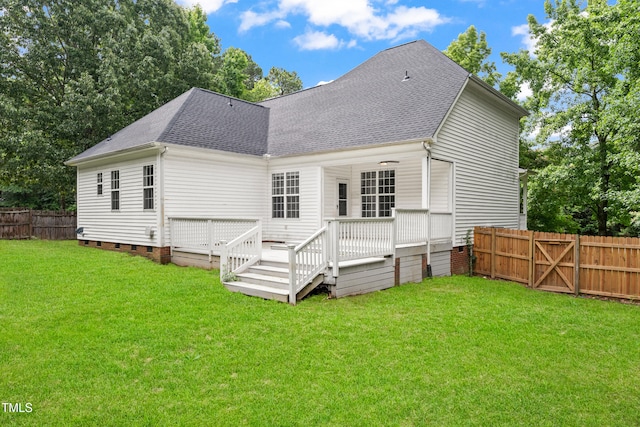 2430 Josephine Rd, Garner, NC 27529 - rear view of house with crawl space, a shingled roof, a fenced backyard, and a deck