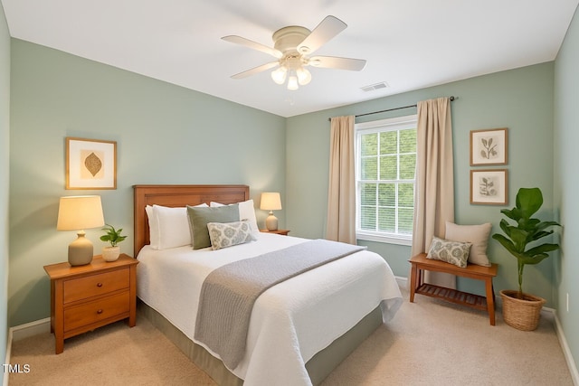 2430 Josephine Rd, Garner, NC 27529 - bedroom with light colored carpet and ceiling fan