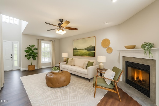 2430 Josephine Rd, Garner, NC 27529 - living room with wood finished floors, a high end fireplace, and a ceiling fan