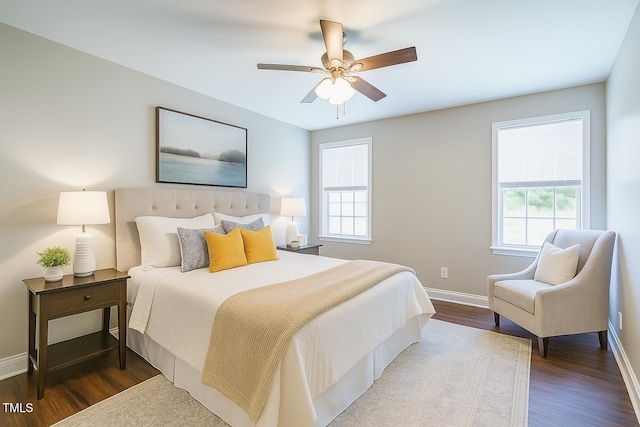 2430 Josephine Rd, Garner, NC 27529 - bedroom with multiple windows, wood finished floors, and ceiling fan