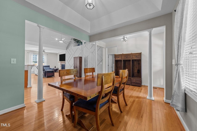 2813 Greenridge View Ln, Zebulon, NC 27597 - dining room with ornate columns, ceiling fan, and light wood-style floors
