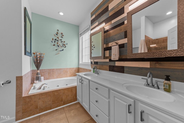 2813 Greenridge View Ln, Zebulon, NC 27597 - bathroom featuring a tub with jets, double vanity, and tile patterned floors