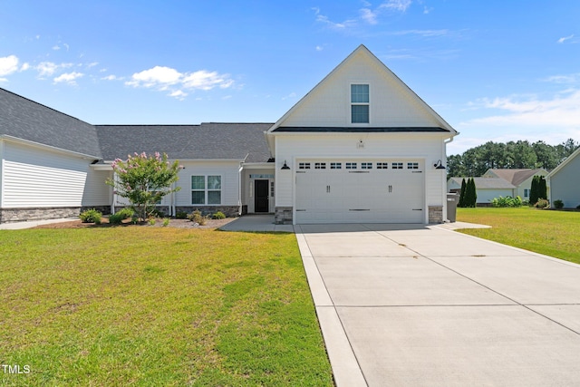 310 Oak Pointe Cir E, Lumberton, NC 28358 - traditional home with stone siding, a front yard, and driveway