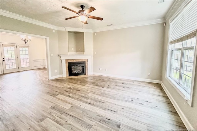 37 Annapolis Rd, Cameron, NC 28326 - unfurnished living room featuring wood finished floors, a fireplace, ornamental molding, a ceiling fan, and a chandelier