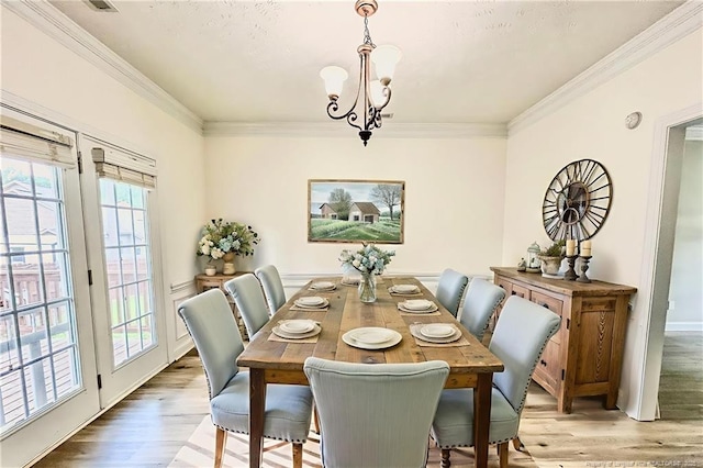 37 Annapolis Rd, Cameron, NC 28326 - dining room featuring light wood-style floors, ornamental molding, and a chandelier