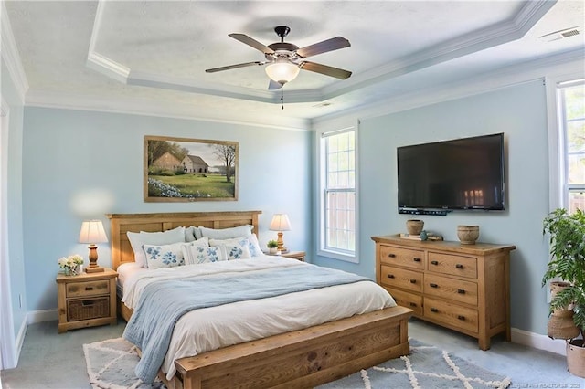 37 Annapolis Rd, Cameron, NC 28326 - bedroom with a raised ceiling, multiple windows, crown molding, and light carpet