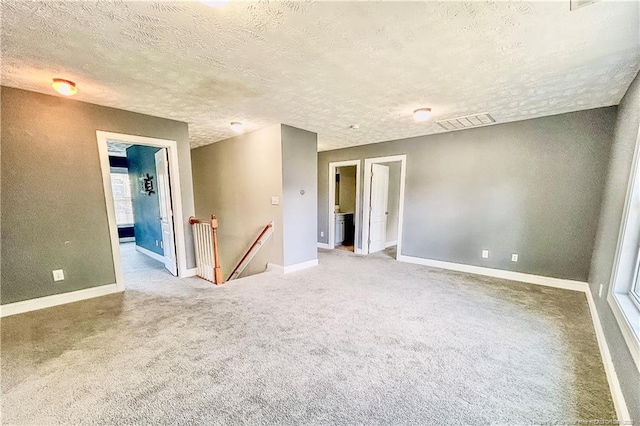 37 Annapolis Rd, Cameron, NC 28326 - spare room featuring a textured ceiling and light colored carpet