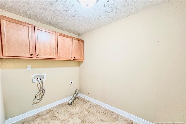 37 Annapolis Rd, Cameron, NC 28326 - laundry area featuring cabinet space, hookup for a washing machine, hookup for an electric dryer, hookup for a gas dryer, and a textured ceiling