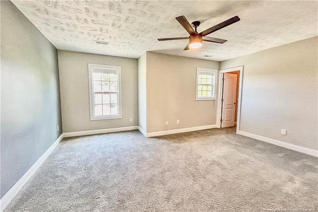 37 Annapolis Rd, Cameron, NC 28326 - carpeted spare room with ceiling fan and a textured ceiling