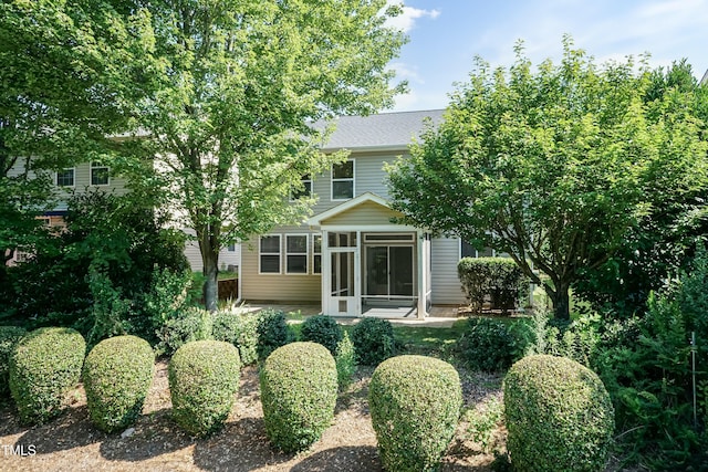 418 Byrams Ford Dr, Cary, NC 27513 - rear view of property with a sunroom and roof with shingles