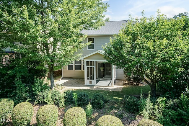 418 Byrams Ford Dr, Cary, NC 27513 - rear view of property with a patio, a sunroom, and roof with shingles