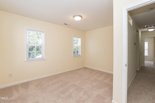 418 Byrams Ford Dr, Cary, NC 27513 - unfurnished room with light carpet, healthy amount of natural light, and a smoke detector