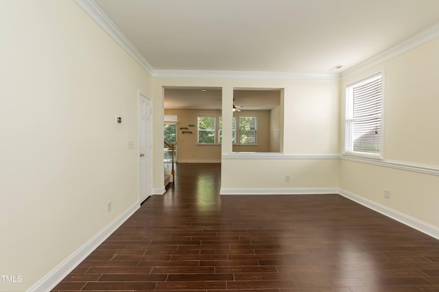 418 Byrams Ford Dr, Cary, NC 27513 - spare room featuring crown molding, dark wood-style floors, and a ceiling fan