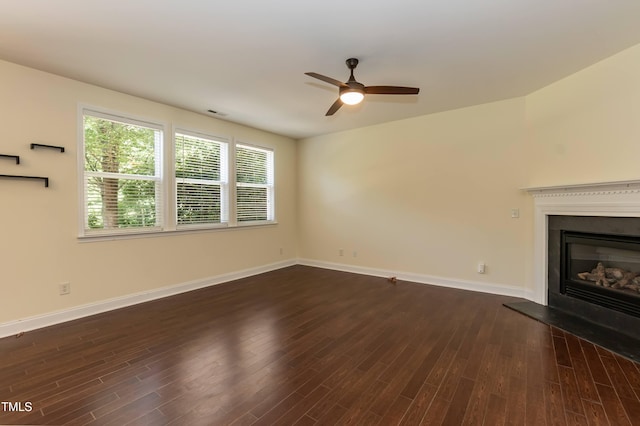 418 Byrams Ford Dr, Cary, NC 27513 - unfurnished living room with a ceiling fan, dark wood-type flooring, and a glass covered fireplace