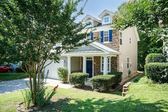 418 Byrams Ford Dr, Cary, NC 27513 - view of front of property with stone siding, a front yard, and driveway