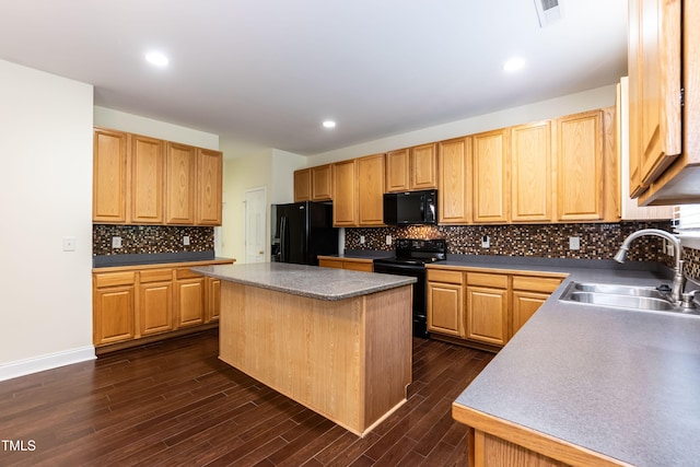 418 Byrams Ford Dr, Cary, NC 27513 - kitchen featuring black appliances, a center island, dark wood finished floors, decorative backsplash, and recessed lighting