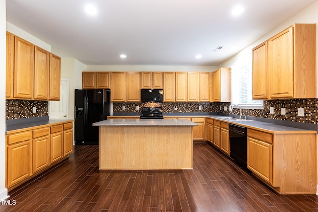 418 Byrams Ford Dr, Cary, NC 27513 - kitchen featuring black appliances, a kitchen island, dark wood-style flooring, backsplash, and light brown cabinets