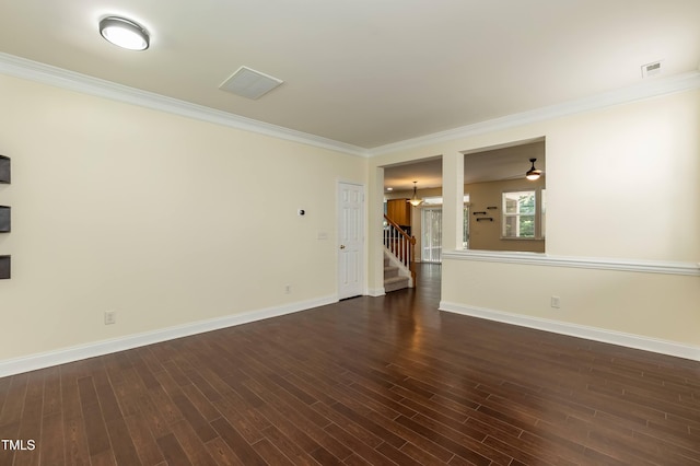 418 Byrams Ford Dr, Cary, NC 27513 - empty room with stairs, crown molding, and dark wood-type flooring