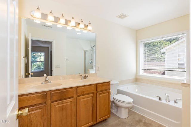 418 Byrams Ford Dr, Cary, NC 27513 - bathroom featuring double vanity, tile patterned flooring, a garden tub, and a shower