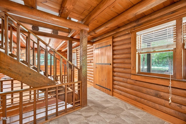 3263 S Jim Minor Rd, Haw River, NC 27258 - hallway featuring a wood ceiling with exposed beams and rustic walls