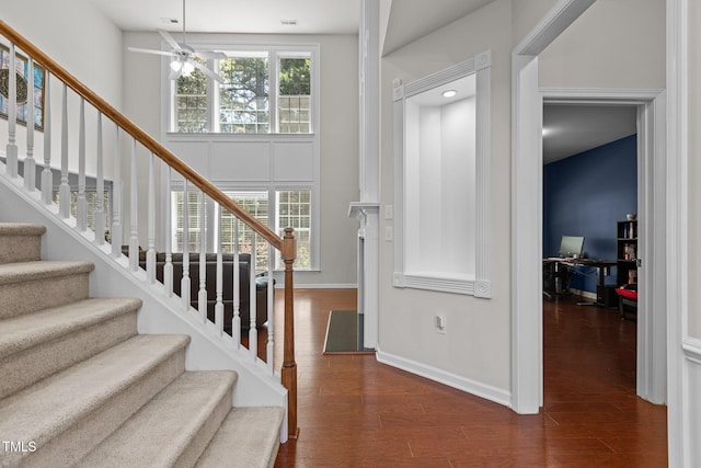 308 Sutton Glen Dr, Apex, NC 27523 - entrance foyer with dark wood-style floors, stairs, and ceiling fan