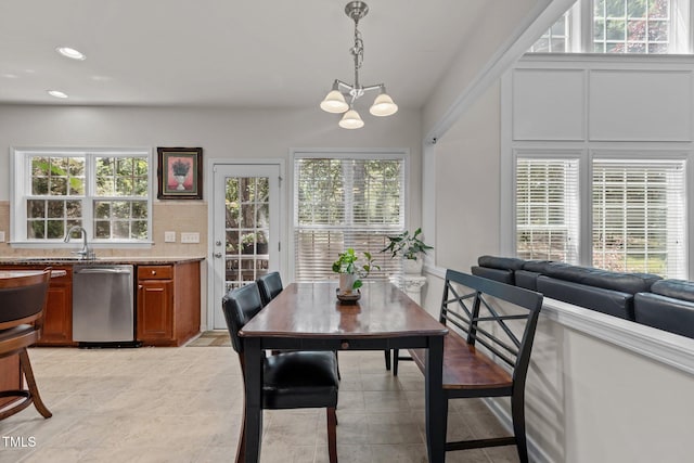308 Sutton Glen Dr, Apex, NC 27523 - dining space featuring a chandelier, plenty of natural light, and recessed lighting