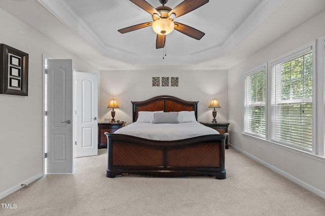 308 Sutton Glen Dr, Apex, NC 27523 - bedroom with a tray ceiling, light colored carpet, ceiling fan, and ornamental molding
