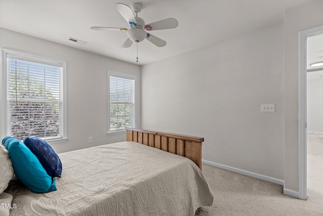 308 Sutton Glen Dr, Apex, NC 27523 - carpeted bedroom featuring baseboards and ceiling fan