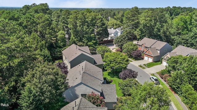 308 Sutton Glen Dr, Apex, NC 27523 - aerial view of residential area with a forest