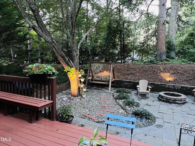 308 Sutton Glen Dr, Apex, NC 27523 - wooden terrace featuring an outdoor fire pit and a patio