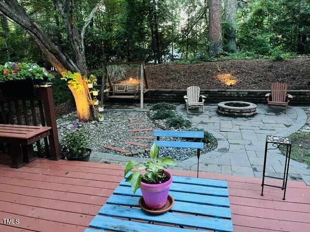308 Sutton Glen Dr, Apex, NC 27523 - deck with an outdoor fire pit and a patio area