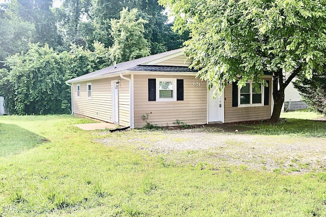 621 Reservoir St, Durham, NC 27703 - bungalow with a front yard and roof with shingles