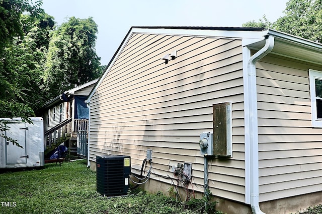 621 Reservoir St, Durham, NC 27703 - view of property exterior featuring a central AC unit