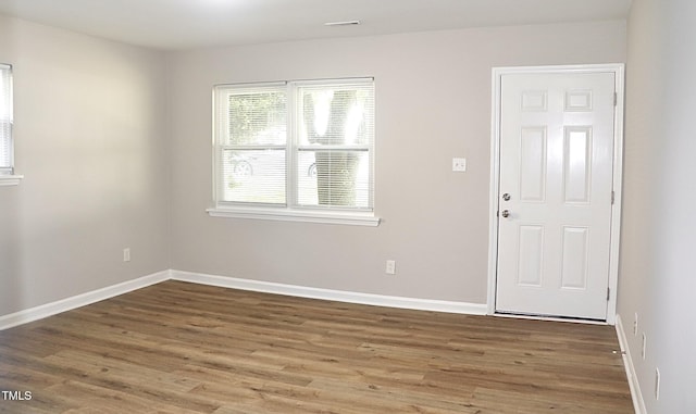 621 Reservoir St, Durham, NC 27703 - entryway featuring wood finished floors and baseboards