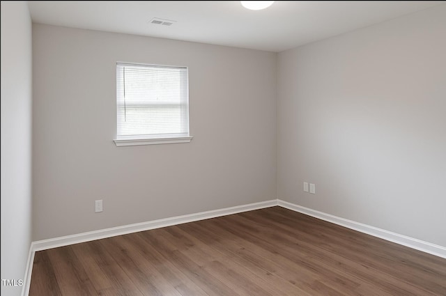 621 Reservoir St, Durham, NC 27703 - unfurnished room featuring dark wood finished floors and baseboards