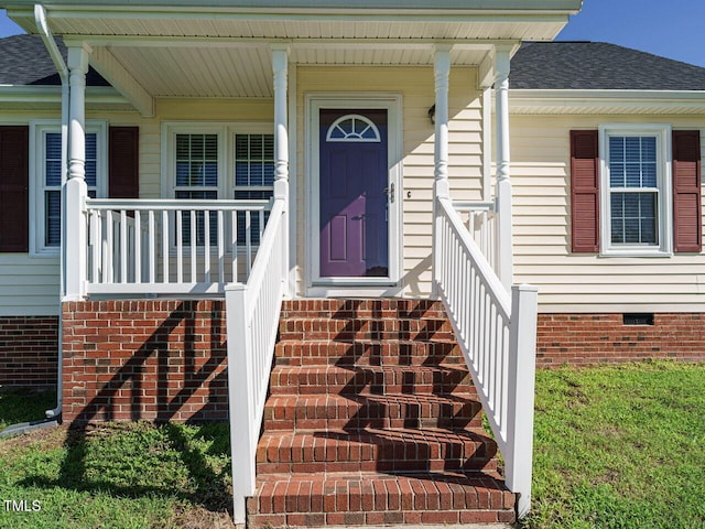 516 Yellow Berry, Wendell, NC 27591 - view of exterior entry featuring crawl space, a shingled roof, and covered porch