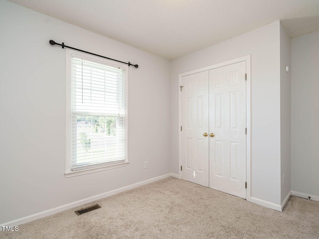 516 Yellow Berry, Wendell, NC 27591 - unfurnished bedroom with carpet flooring and a closet