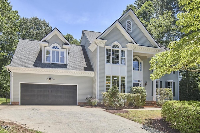 110 Duckwood Ln, Cary, NC 27518 - view of front of home with concrete driveway, roof with shingles, and an attached garage