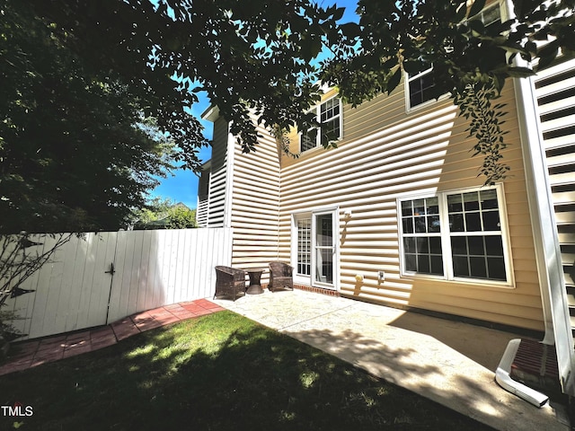 2069 White Pond Ct, Apex, NC 27523 - rear view of property with a patio area