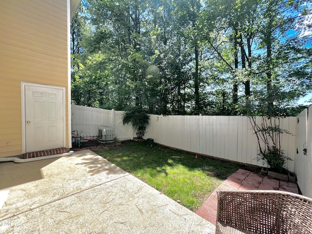 2069 White Pond Ct, Apex, NC 27523 - fenced backyard featuring a patio