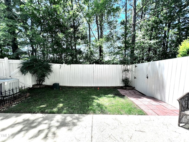 2069 White Pond Ct, Apex, NC 27523 - fenced backyard with a patio area