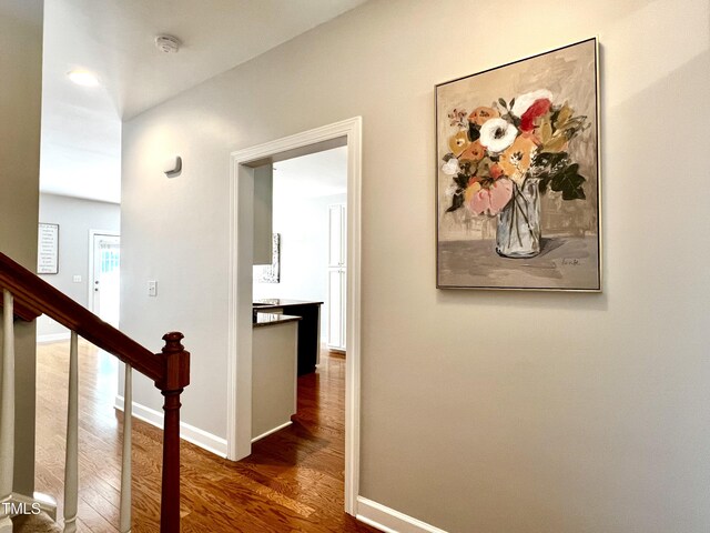 2069 White Pond Ct, Apex, NC 27523 - hallway with wood finished floors and baseboards