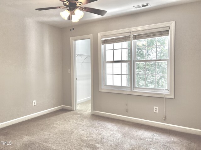 2069 White Pond Ct, Apex, NC 27523 - spare room with carpet floors and ceiling fan