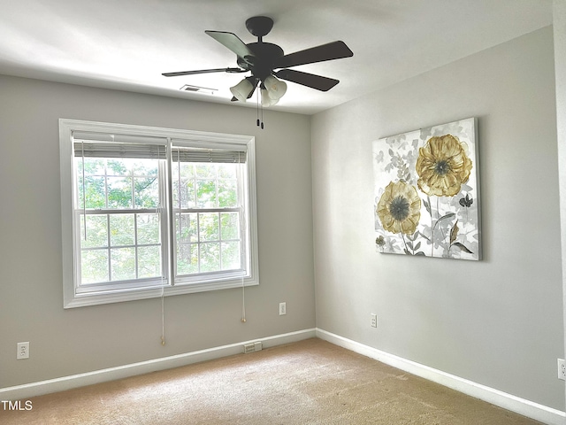 2069 White Pond Ct, Apex, NC 27523 - carpeted empty room featuring baseboards and a ceiling fan