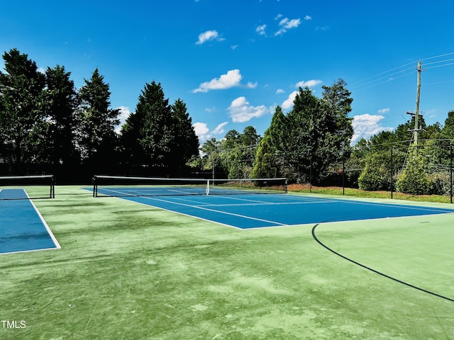 2069 White Pond Ct, Apex, NC 27523 - view of tennis court featuring view of scattered trees